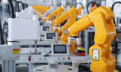 Industrial Automation and Control Industrial automation robotic arms on production line, using optocouplers and control ICs for manufacturing systems